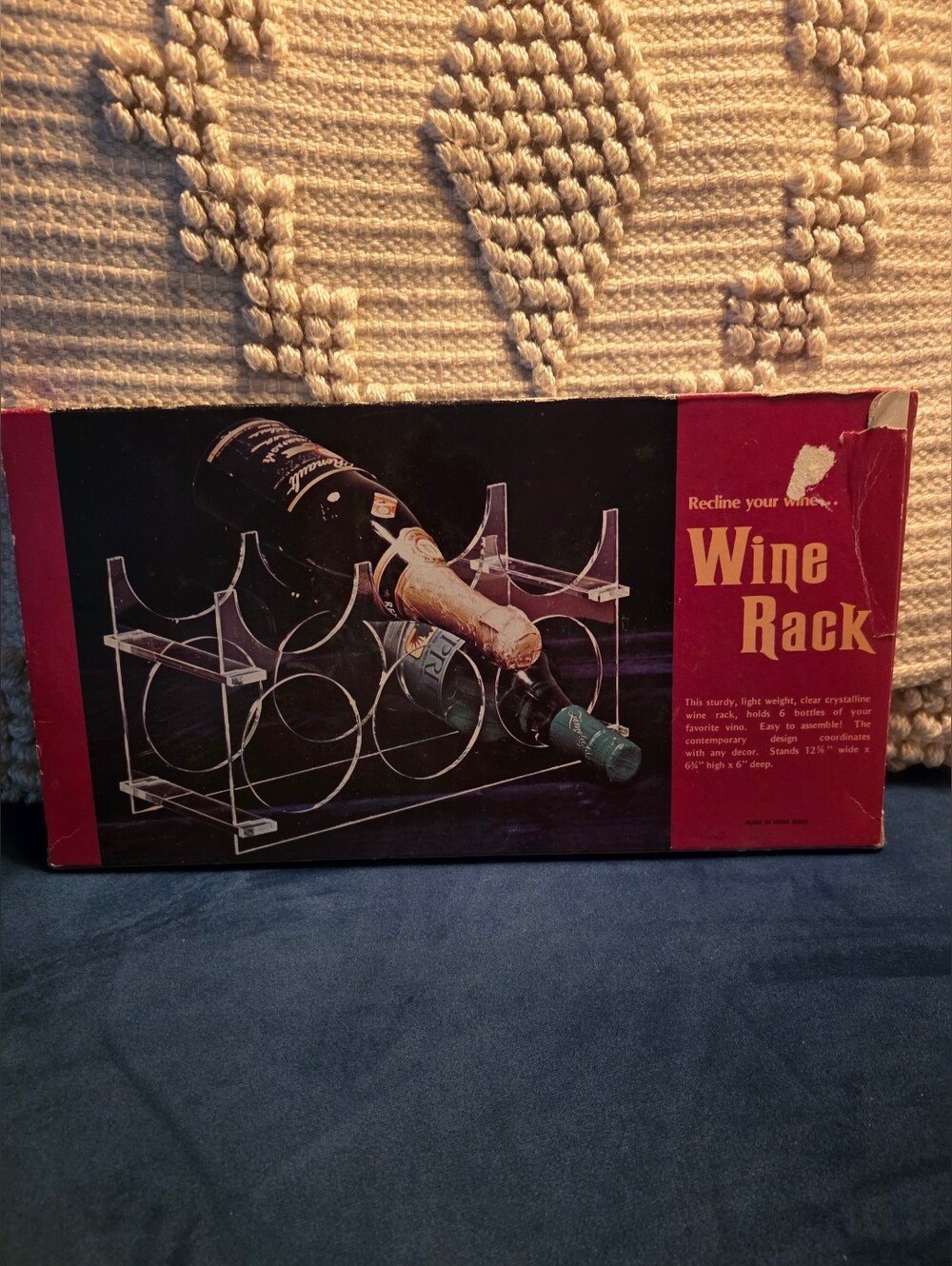 Vintage Regal brand clear acrylic wine rack, designed to hold 6 bottles